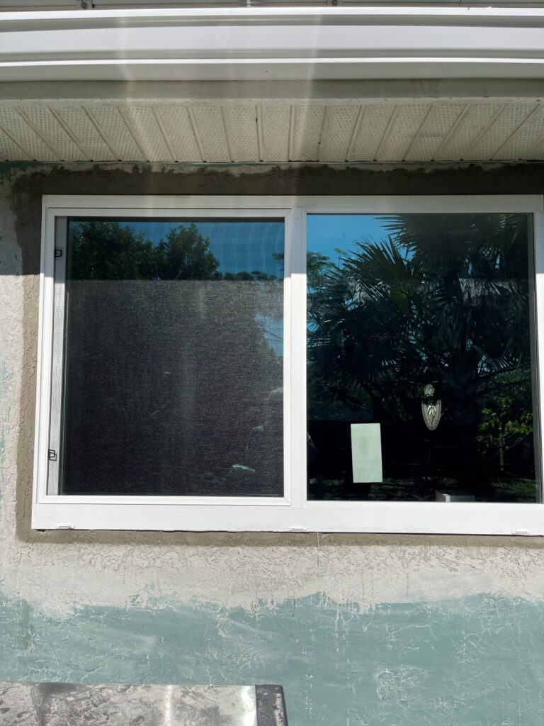 stucco around windows of house